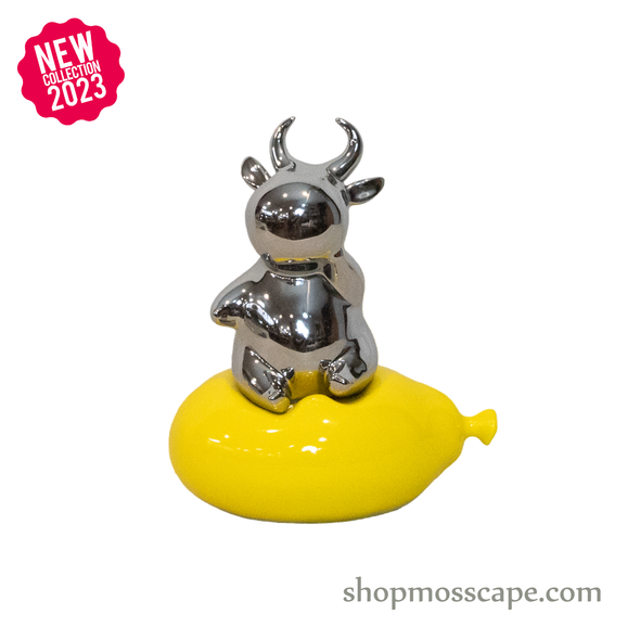 Silver Cow on Yellow Balloon