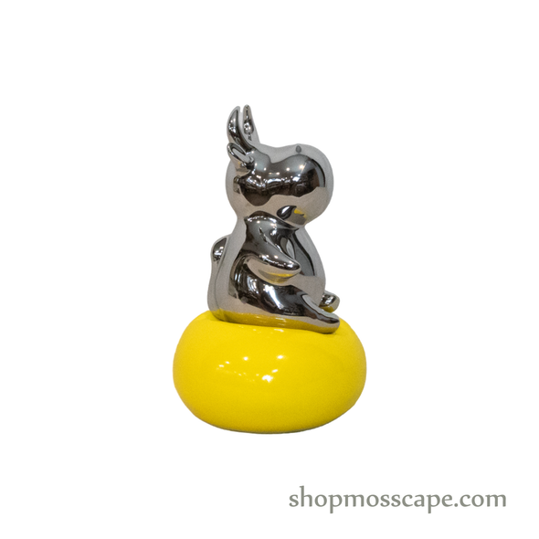 Silver Cow on Yellow Balloon